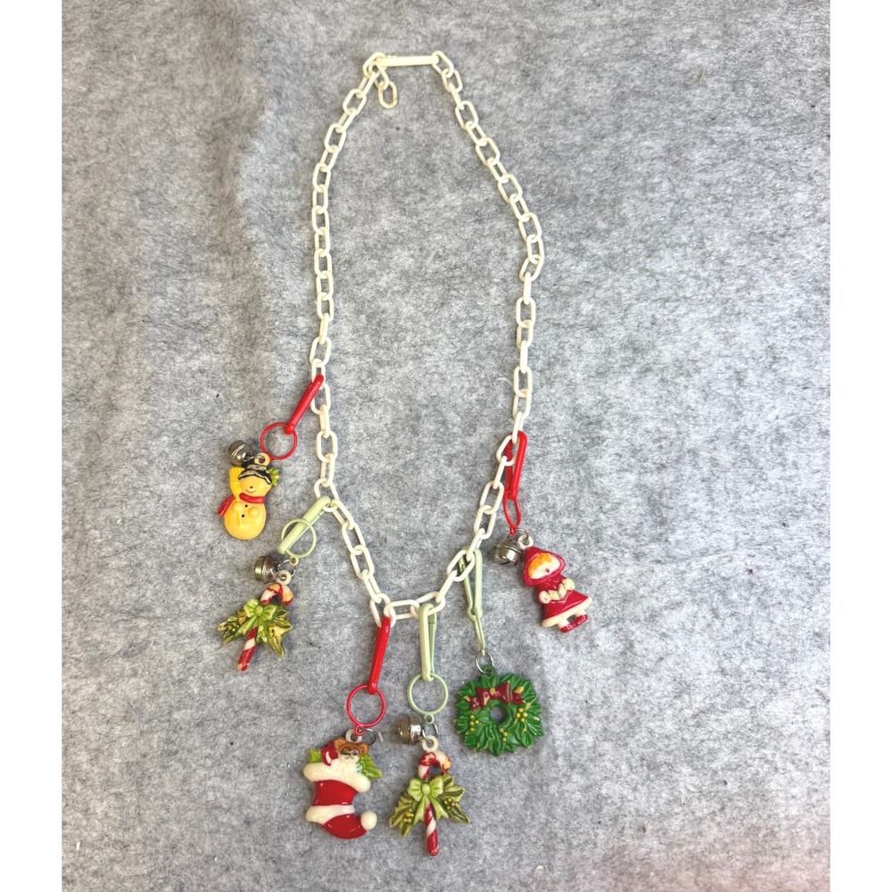 Vintage 80s Plastic Bell Charm Necklace Christmas Snowman Wreath Caroler Kitcsh